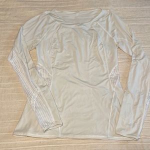 Lululemon white long sleeve tech shirt fits like a medium/large